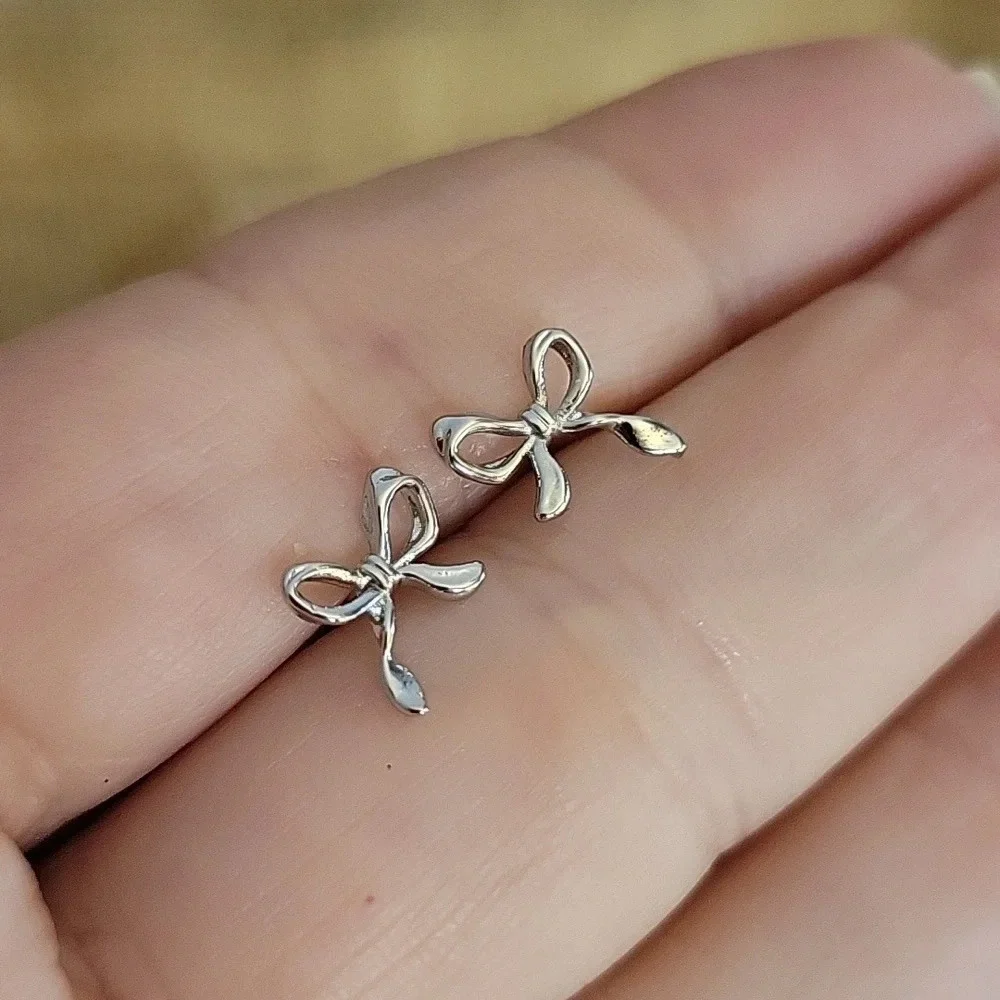 COQUETTE BOW STUD EARRINGS